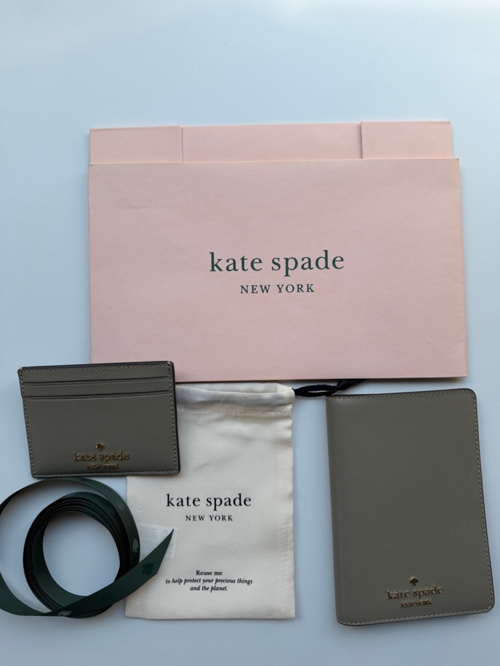 kate spade card holder & passport wallet with gold logo in oyster shell color - Picture 10 of 14
